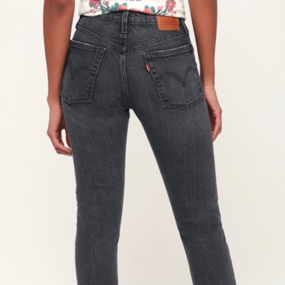 Levi’s 501 Washed Black High Rise Raw Hem Skinny